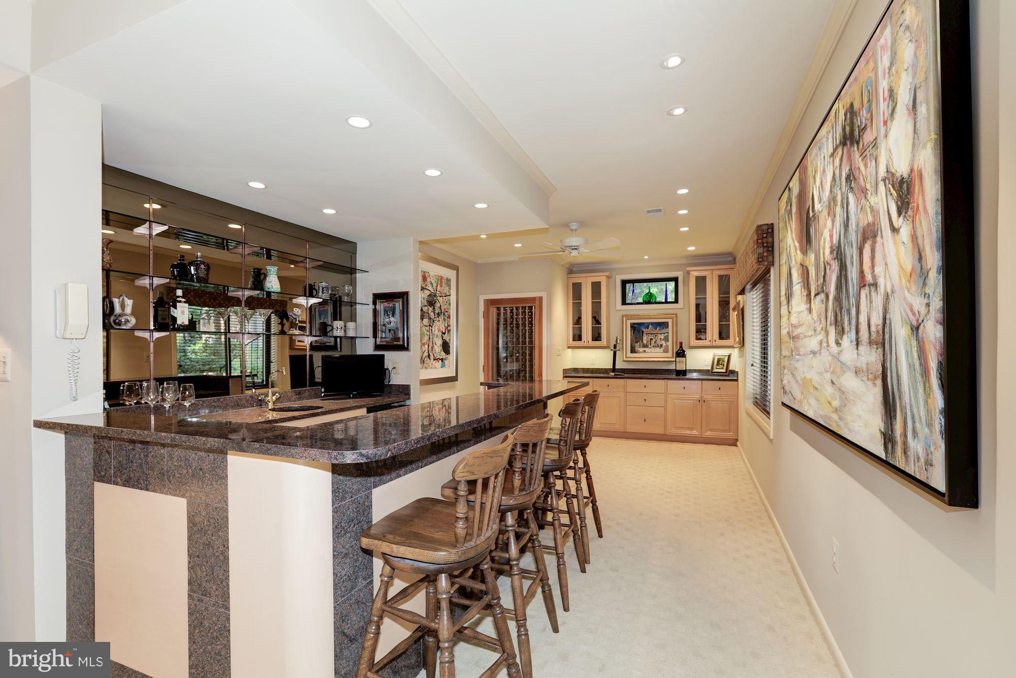 7308 Hooking Road McLean, VA 22101 - Photo 22 of 30 Wet Bar & Built-in Custom 400 Bottle Wine Cave