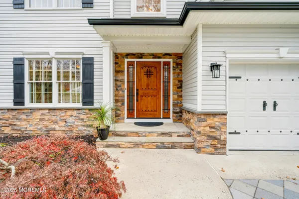 a front view of a house with a outdoor space