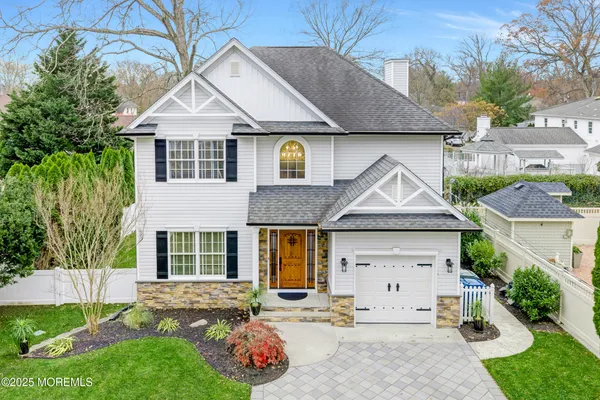 an aerial view of a house with garden