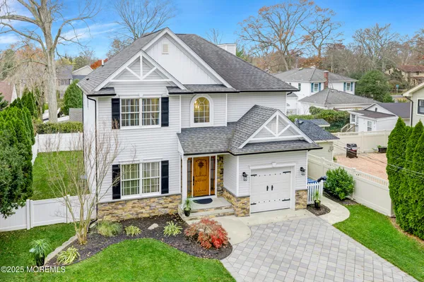 an aerial view of a houses with outdoor space