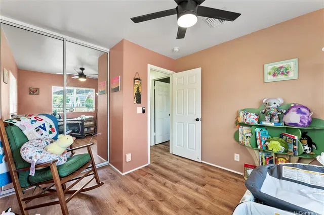 a bedroom with furniture and a bed