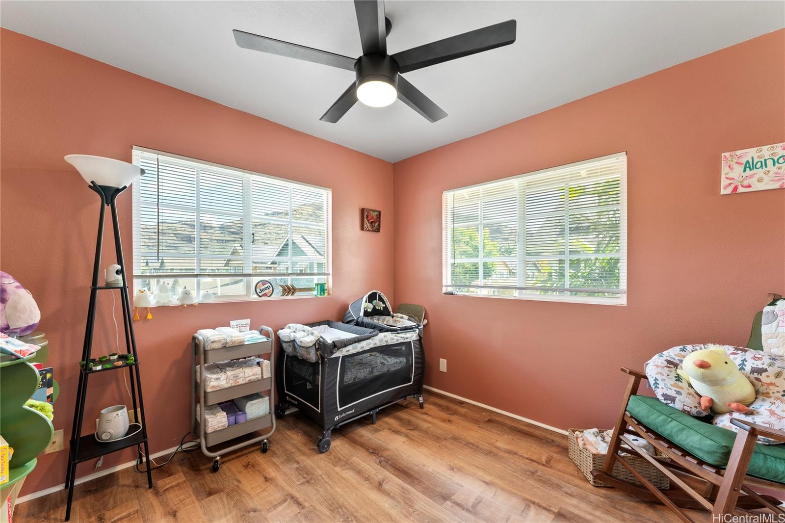 87-1962 Pakeke Street, Unit A Waianae, HI 96792 - Photo 15 of 25 a bedroom with furniture and a window