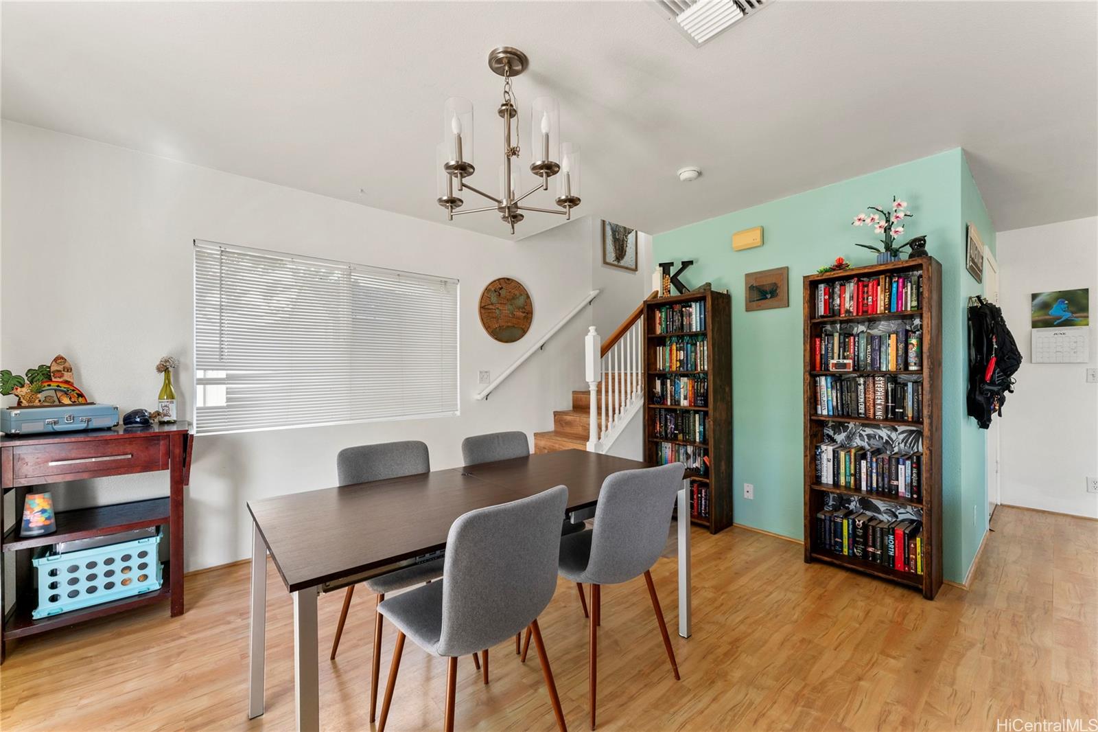 87-1962 Pakeke Street, Unit A Waianae, HI 96792 - Photo 5 of 25 a view of a dining room with furniture and wooden floor