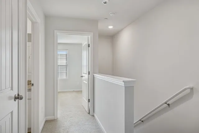 a view of a hallway with closet area