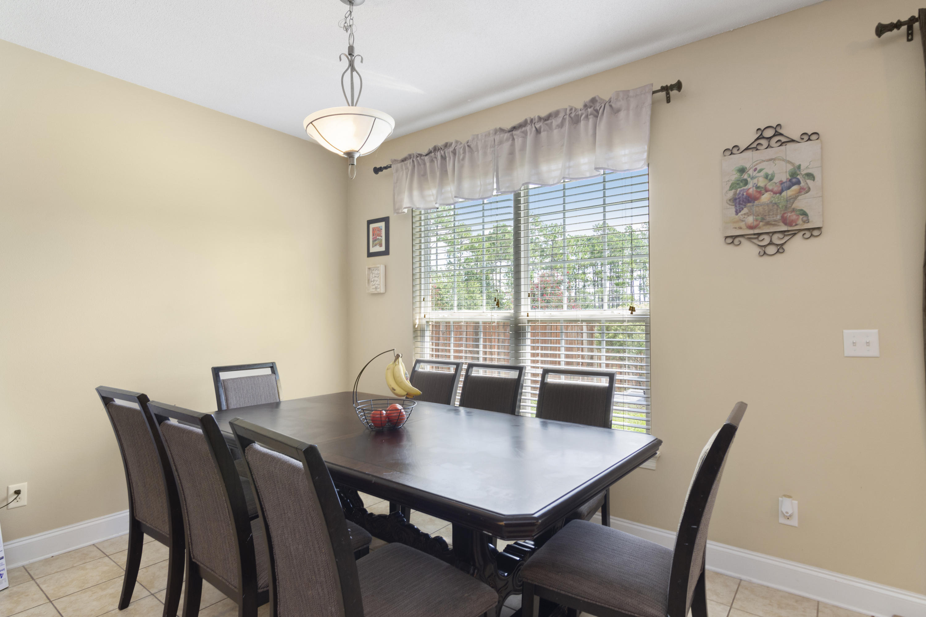 145 Alicia Drive Crestview, FL 32536 - Photo 14 of 32 a view of a dining room with furniture window and outside view