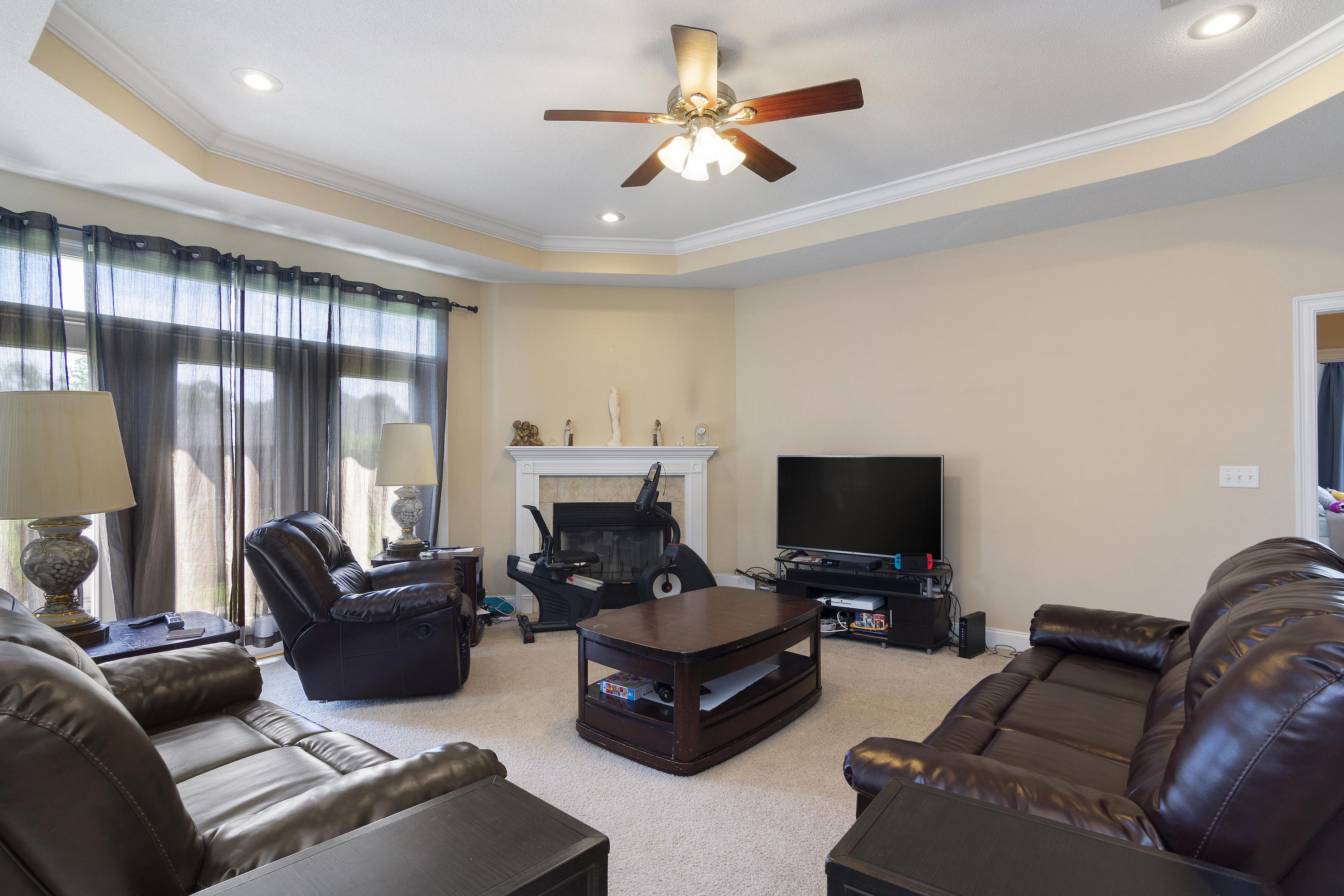145 Alicia Drive Crestview, FL 32536 - Photo 8 of 32 a living room with furniture and a flat screen tv