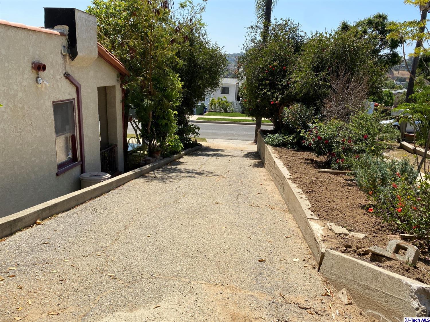 1605 Rueda Drive Los Angeles, CA 90042 - Photo 4 of 5 a view of the house with a yard