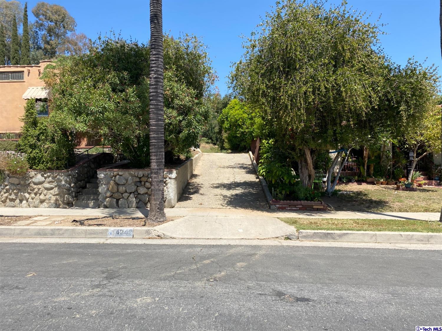 1605 Rueda Drive Los Angeles, CA 90042 - Photo 5 of 5 a view of street with tall trees