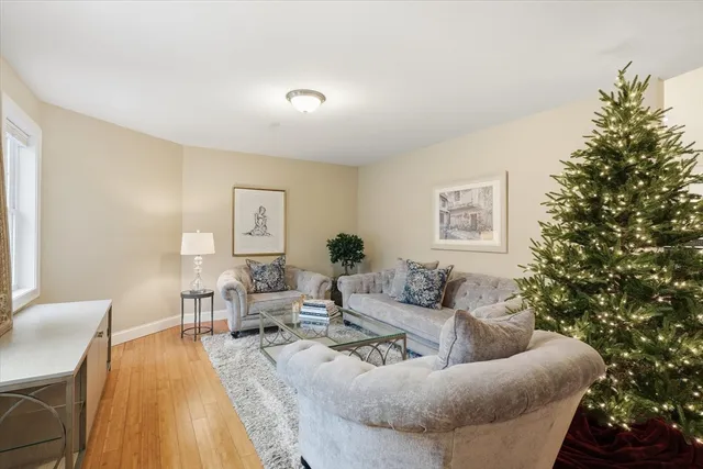 a bathroom with a toilet sink and a mirror