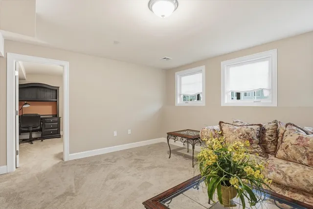 a bathroom with a granite countertop sink toilet and a mirror