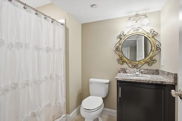 a bedroom with a bed and with furniture