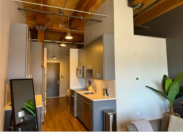 a bathroom with a sink and mirror