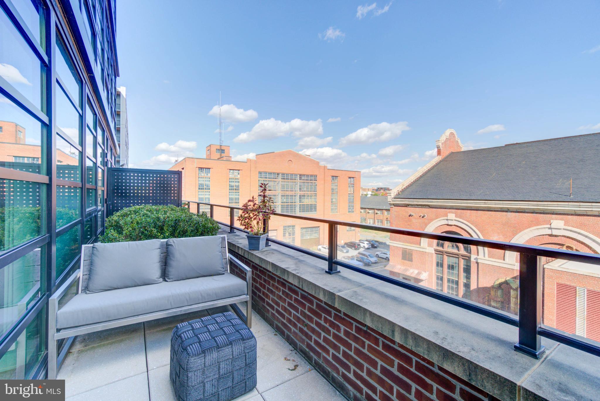 1300 4th Street Southeast, Unit 414 Washington, DC 20003 - Photo 14 of 31 a view of balcony with furniture