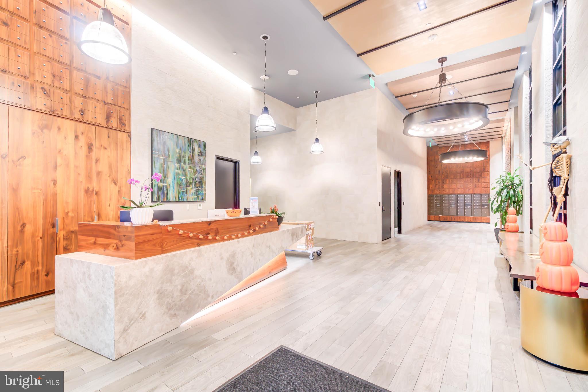 1300 4th Street Southeast, Unit 414 Washington, DC 20003 - Photo 26 of 31 a spacious bathroom with a tub double vanity and a mirror