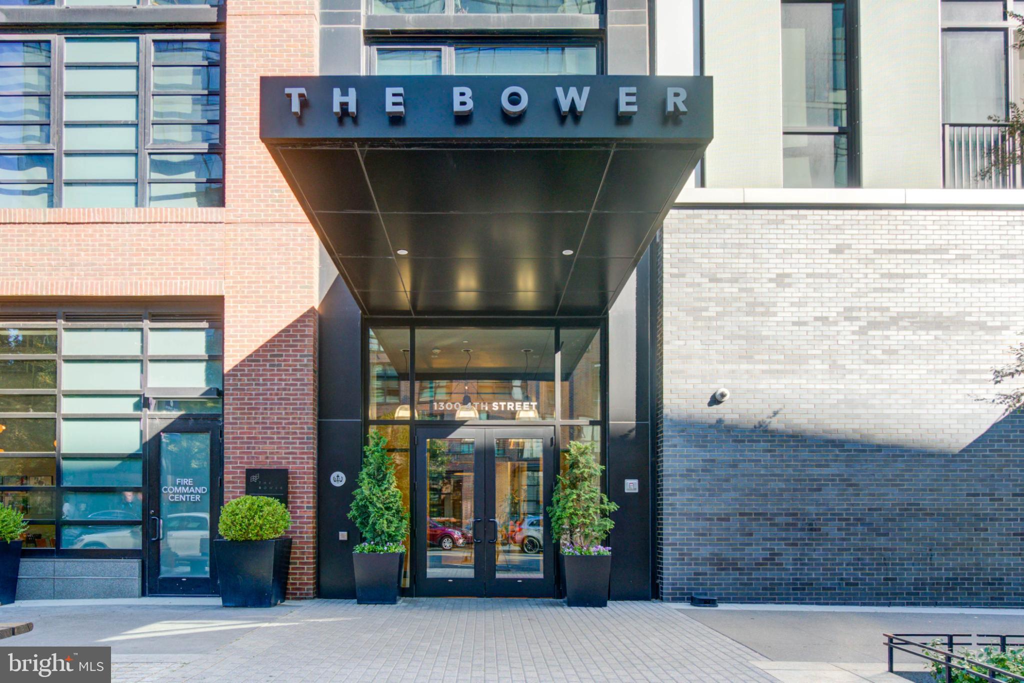 1300 4th Street Southeast, Unit 414 Washington, DC 20003 - Photo 27 of 31 a front view of a house with a garden