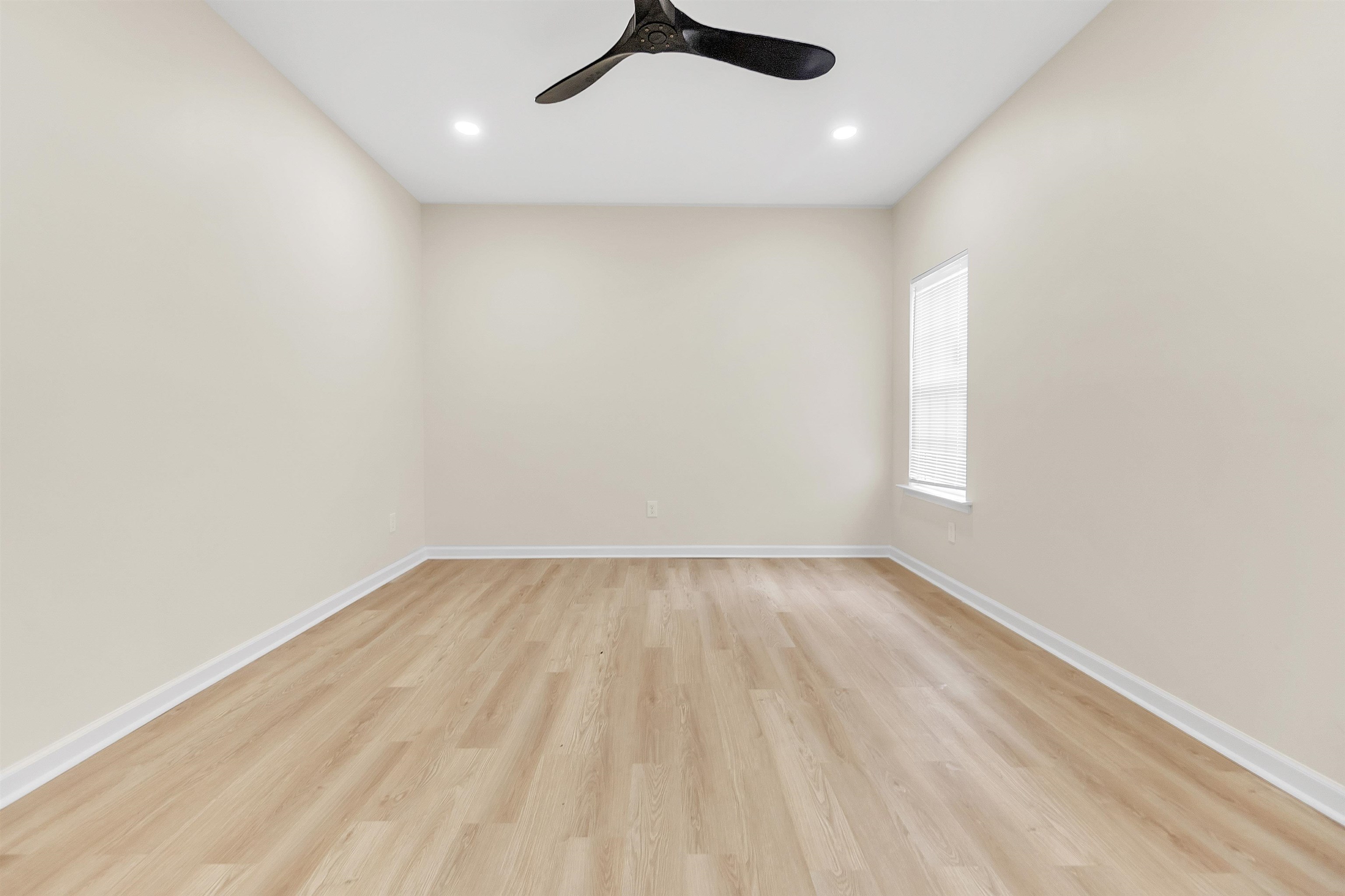 4397 Crescent Park Drive Memphis, TN 38141 - Photo 30 of 40 Spare room with baseboards, light wood-type flooring, ceiling fan, and recessed lighting