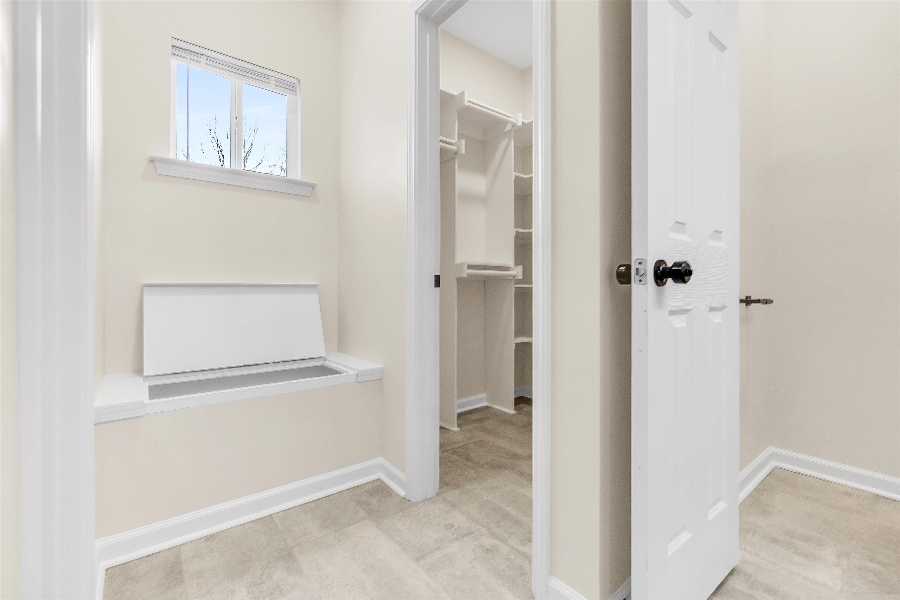 4397 Crescent Park Drive Memphis, TN 38141 - Photo 37 of 40 Hallway featuring baseboards