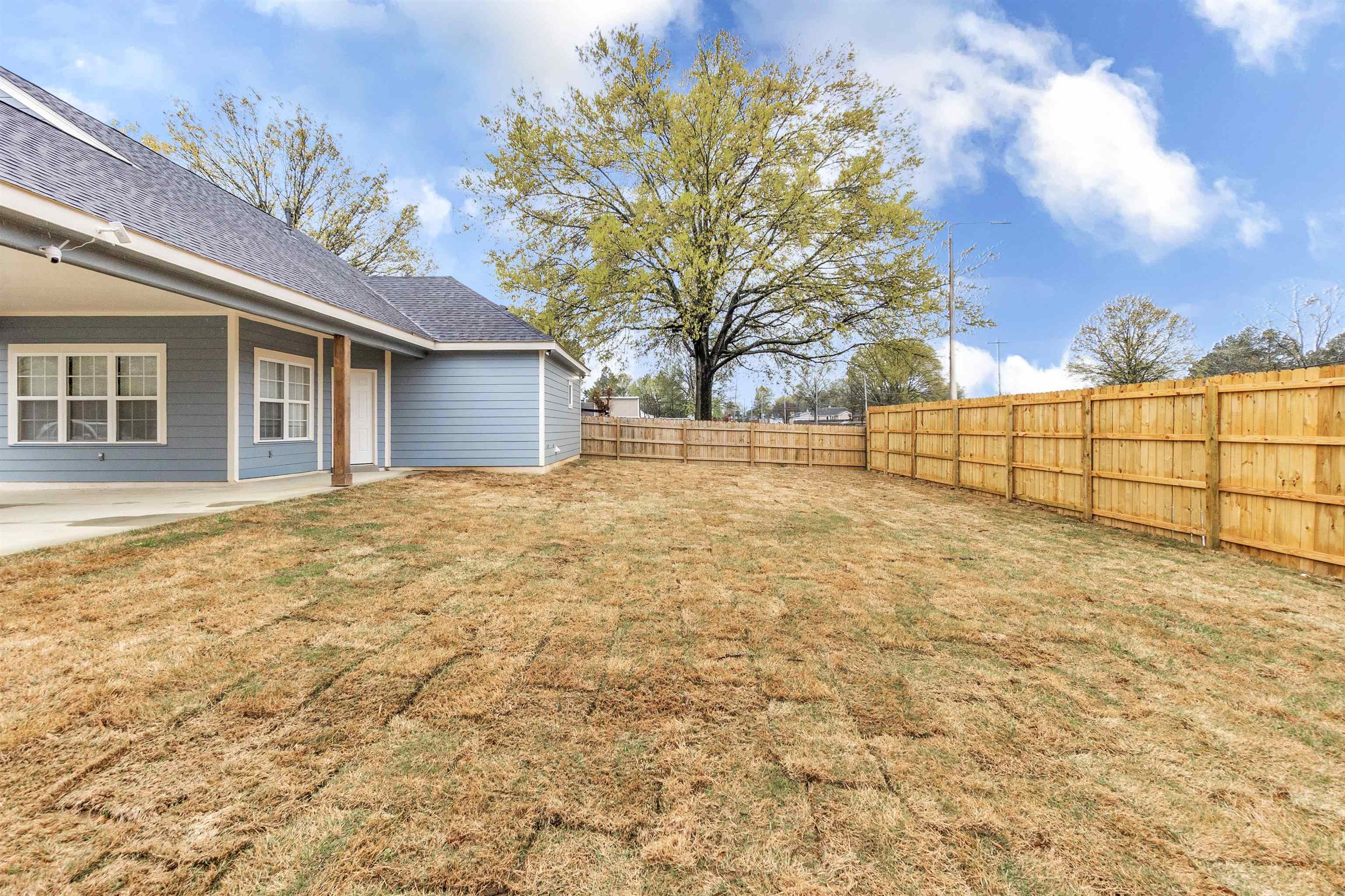 4397 Crescent Park Drive Memphis, TN 38141 - Photo 4 of 40 View of yard featuring a fenced backyard and a patio area