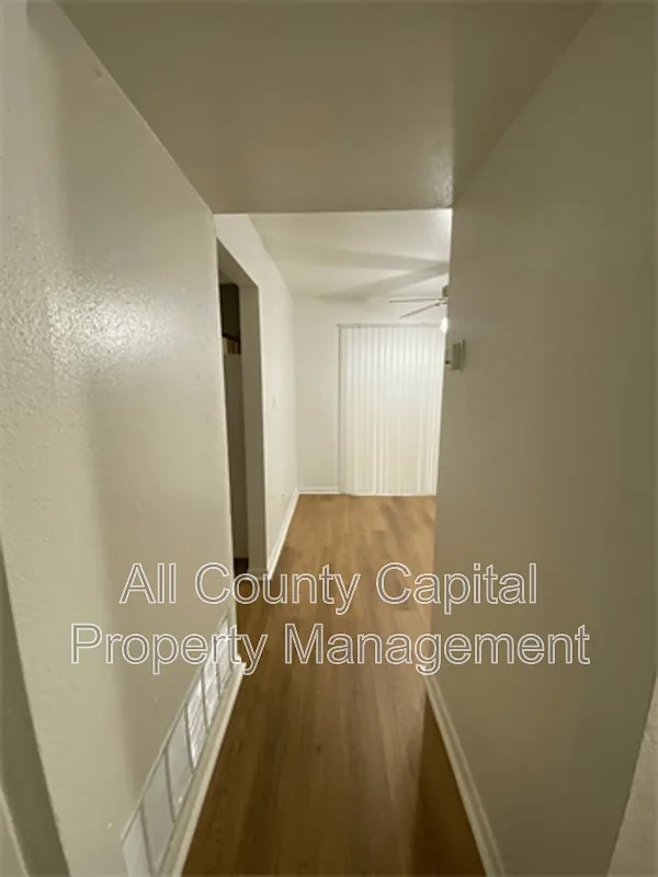 829 Ken Street, Unit B Austin, TX 78753 - Photo 4 of 12 a view of an empty room