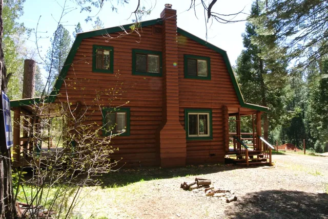a kitchen with stainless steel appliances granite countertop a refrigerator stove and sink