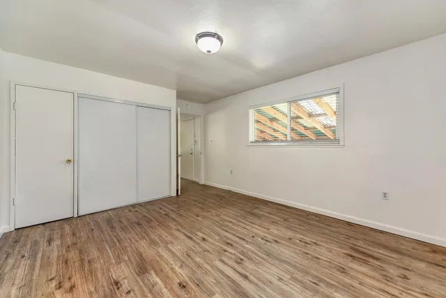 a backyard of a house with lots of green space