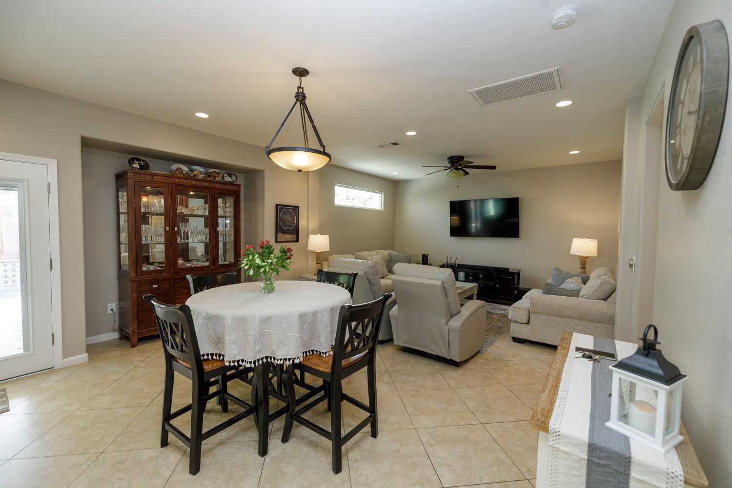 3416 Will Scarlet Way Modesto, CA 95355 - Photo 12 of 56 a view of a dining room with furniture