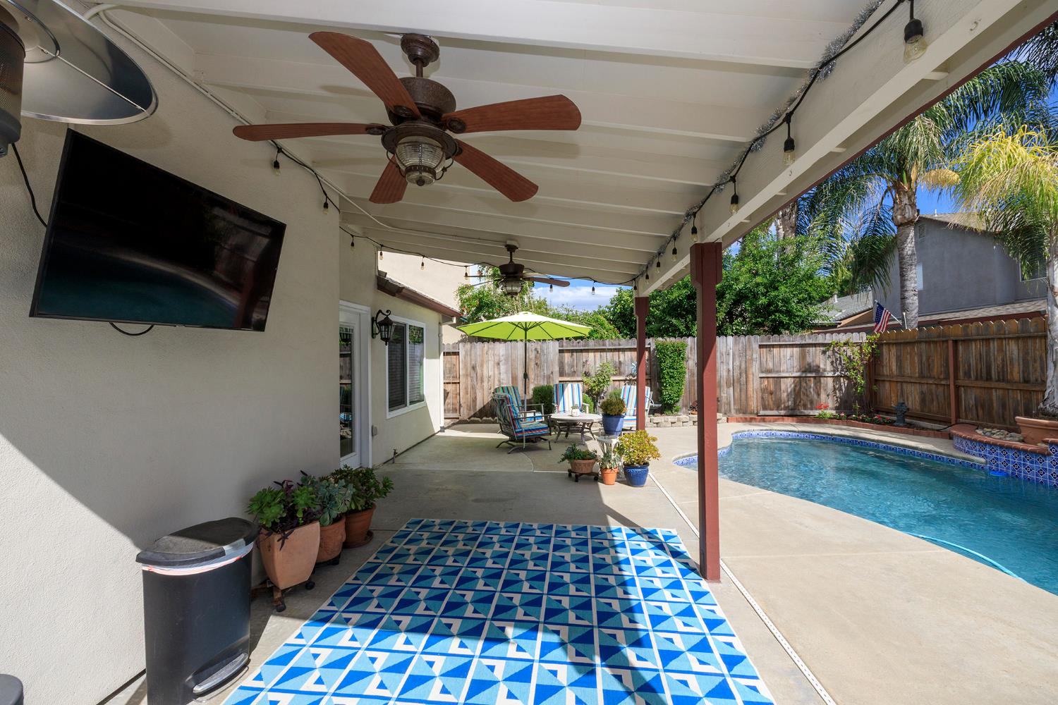 3416 Will Scarlet Way Modesto, CA 95355 - Photo 44 of 56 a view of a porch with furniture
