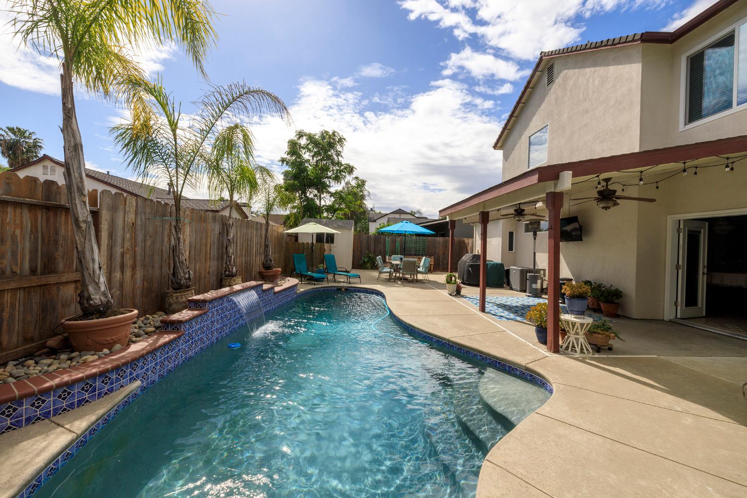 3416 Will Scarlet Way Modesto, CA 95355 - Photo 48 of 56 a view of a house with backyard and sitting area