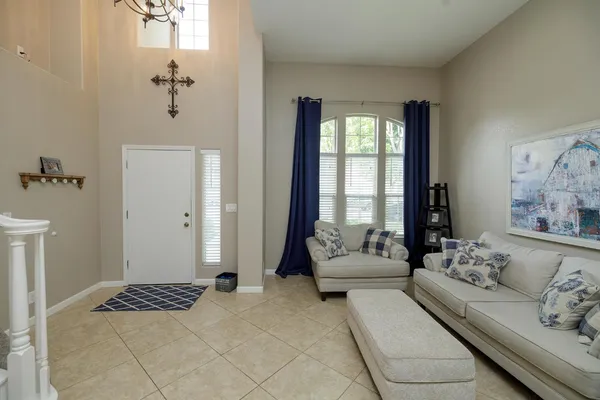 a view of a dining room with furniture window and outside view