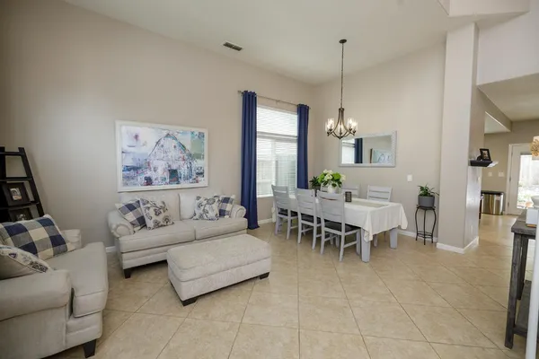 a view of entryway and hall with a front door