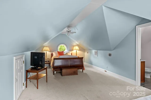 a view of a livingroom with furniture and a couch
