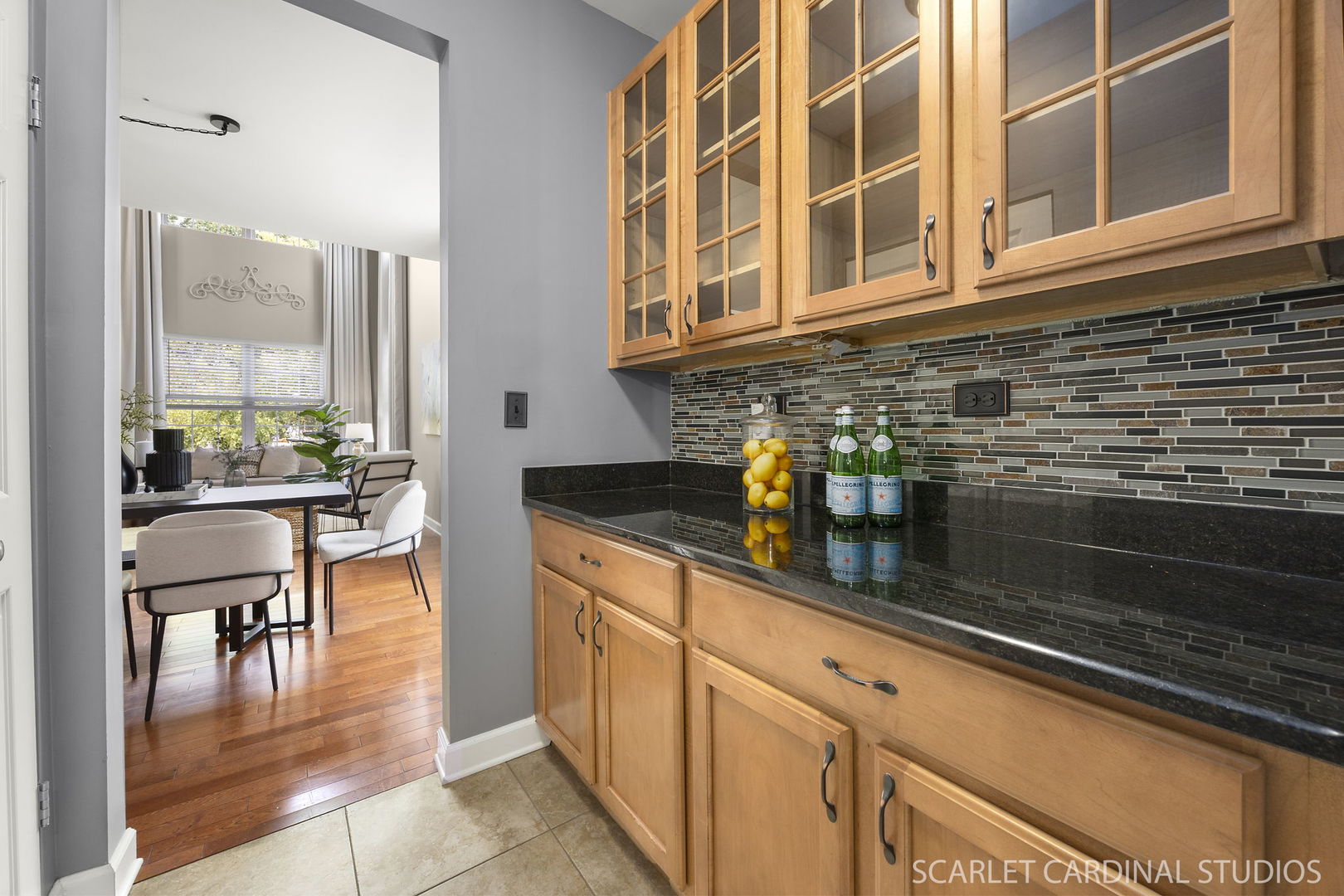 13905 Trillium Lane Plainfield, IL 60544 - Photo 11 of 30 a kitchen with stainless steel appliances granite countertop a stove a sink and a dining table view