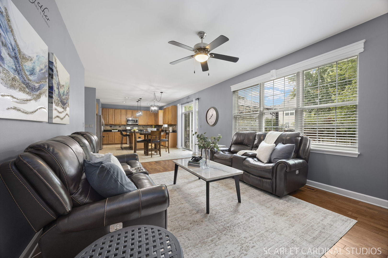 13905 Trillium Lane Plainfield, IL 60544 - Photo 16 of 30 a living room with furniture and a large window