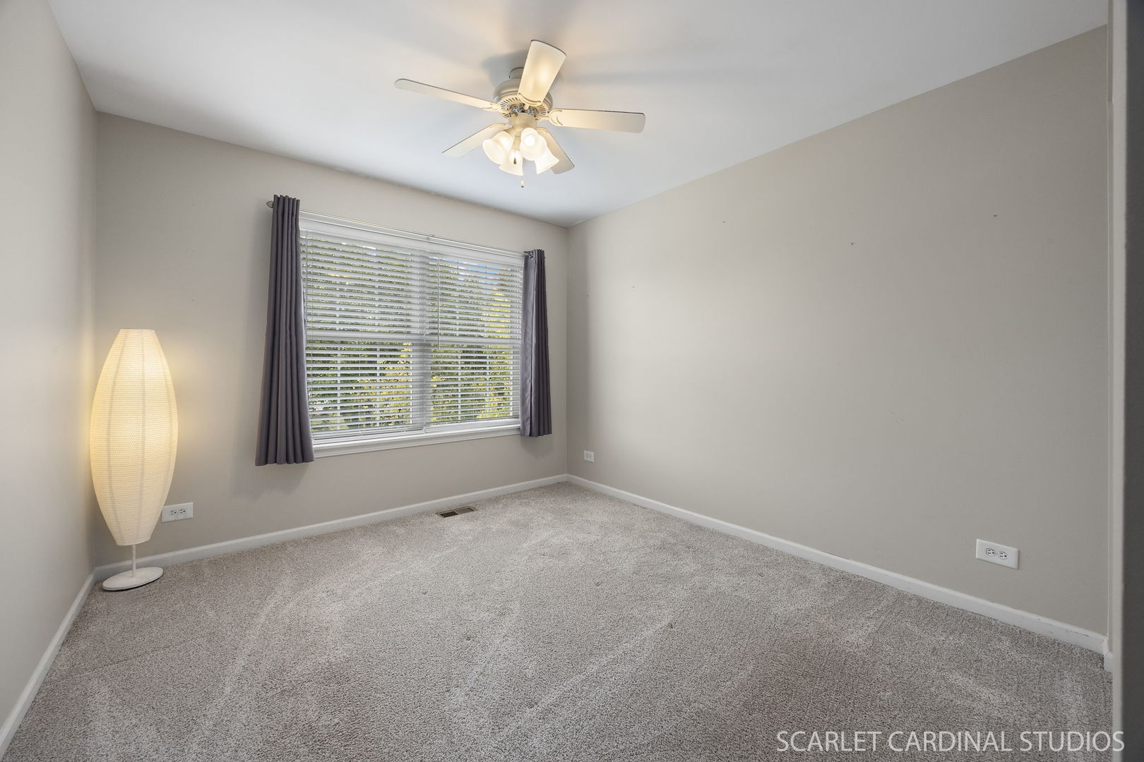 13905 Trillium Lane Plainfield, IL 60544 - Photo 28 of 30 an empty room with windows and fan