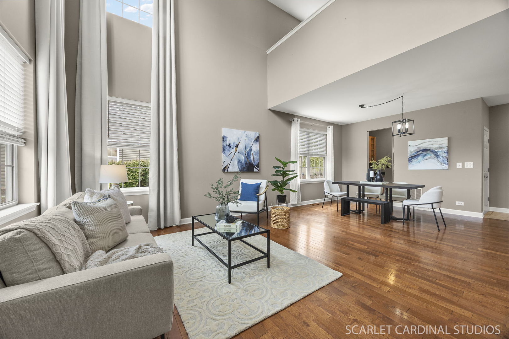 13905 Trillium Lane Plainfield, IL 60544 - Photo 3 of 30 a living room with furniture and floor to ceiling windows