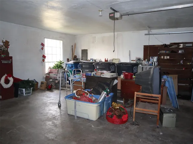 a view of a kitchen with appliances and cabinets
