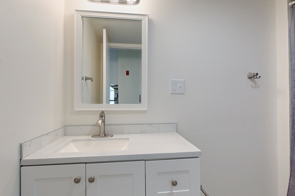 92 Squannacook Road Shirley, MA 01464 - Photo 17 of 38 a bathroom with a sink and a mirror