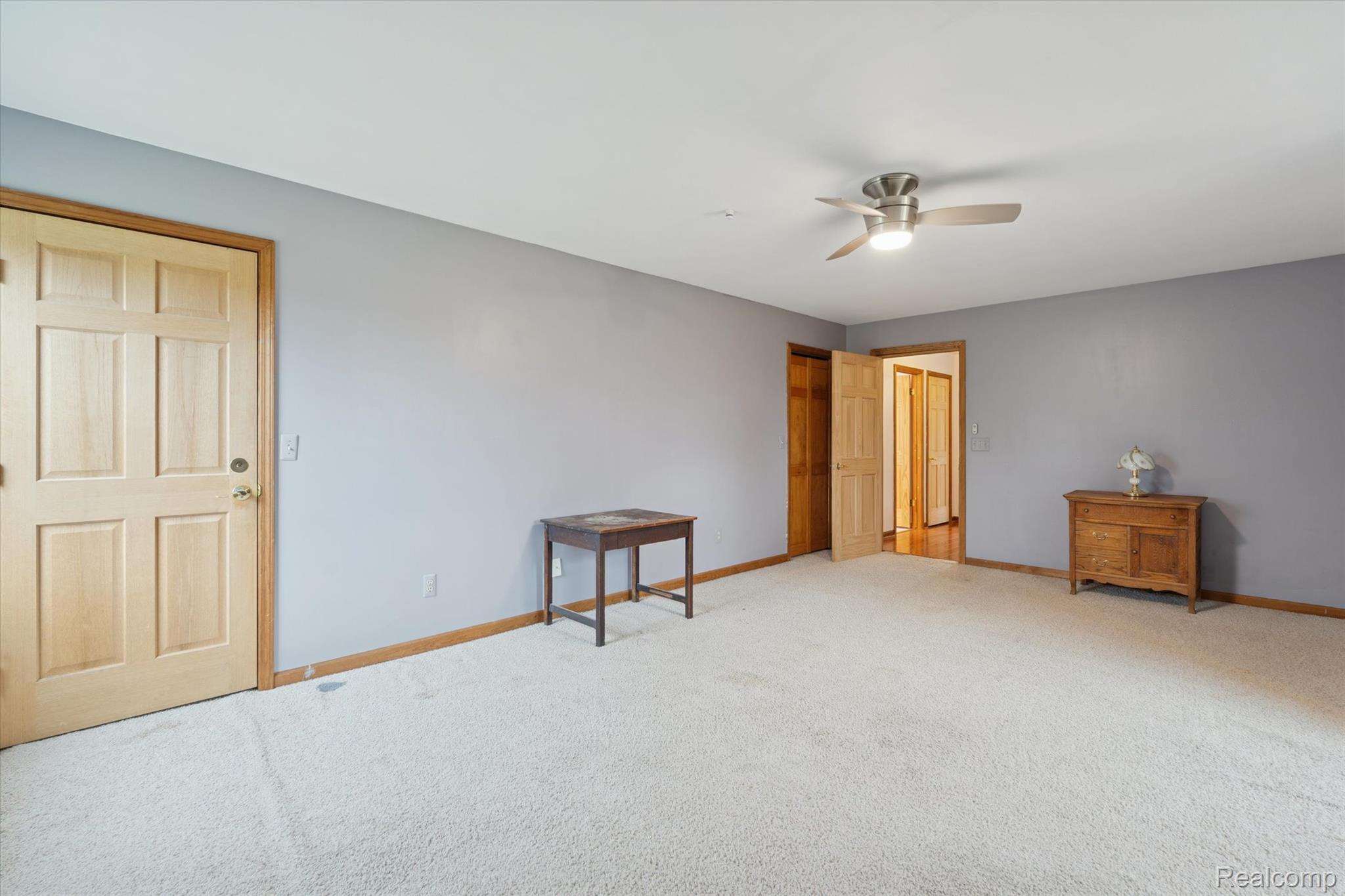 3031 Cedar Point Howell, MI 48843 - Photo 25 of 51 Unfurnished bedroom with carpet floors and a ceiling fan