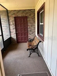 a view of a house with a lounge chair