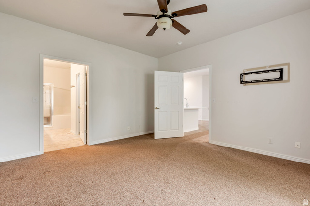 1092 Tithing Ridge Drive Riverton, UT 84065 - Photo 9 of 25 Primary bedroom with entrance to ensuite