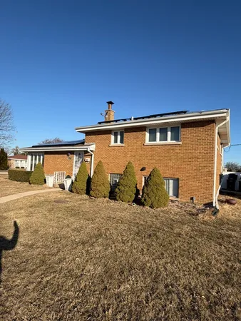 a front view of a house with garage