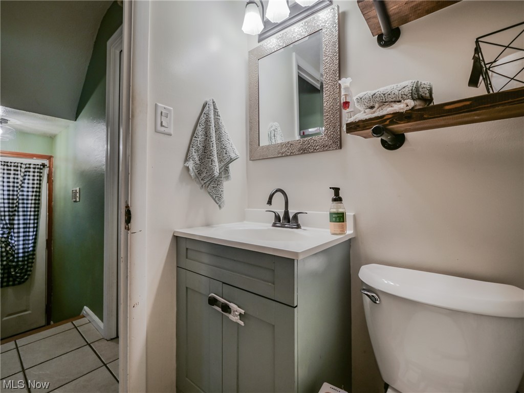 2378 Charney Road Cleveland, OH 44118 - Photo 12 of 28 Bathroom with tile flooring, toilet, and vanity