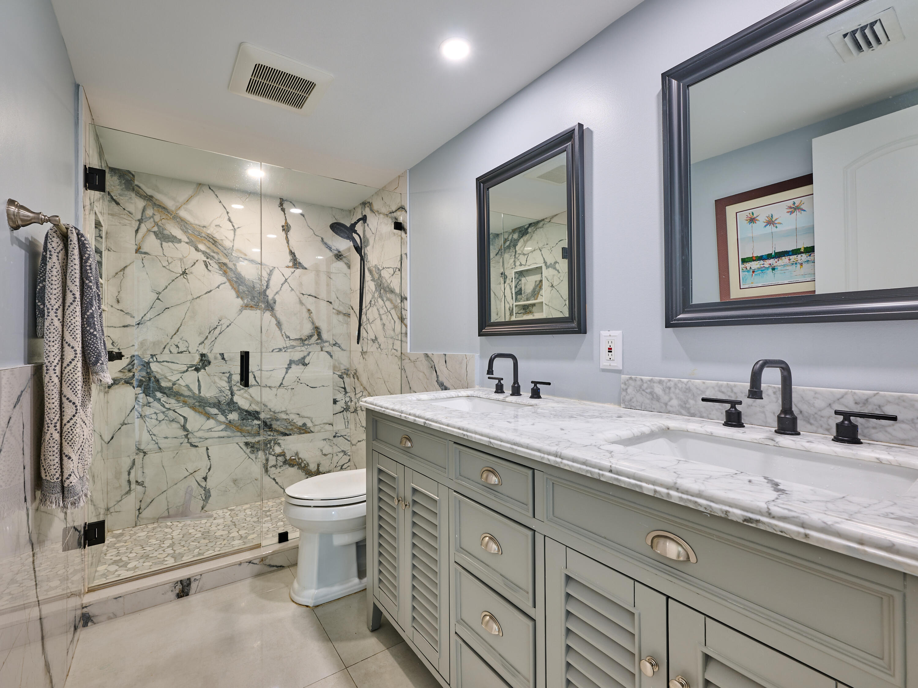 Undisclosed Address Jupiter, FL 33477 - Photo 11 of 20 a bathroom with a granite countertop sink mirror vanity and toilet