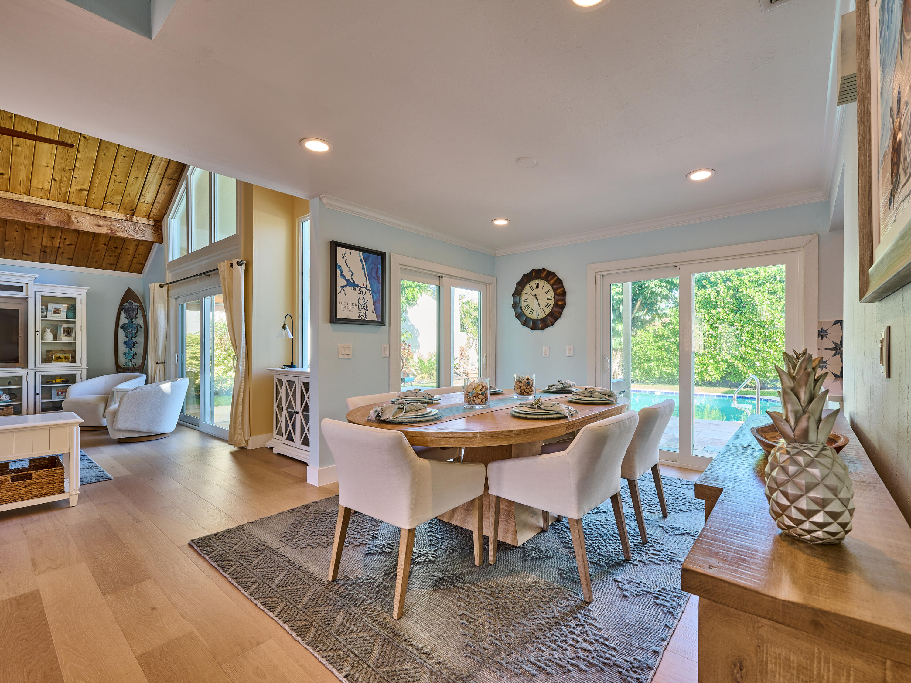Undisclosed Address Jupiter, FL 33477 - Photo 4 of 20 a view of a dining room with furniture window and wooden floor