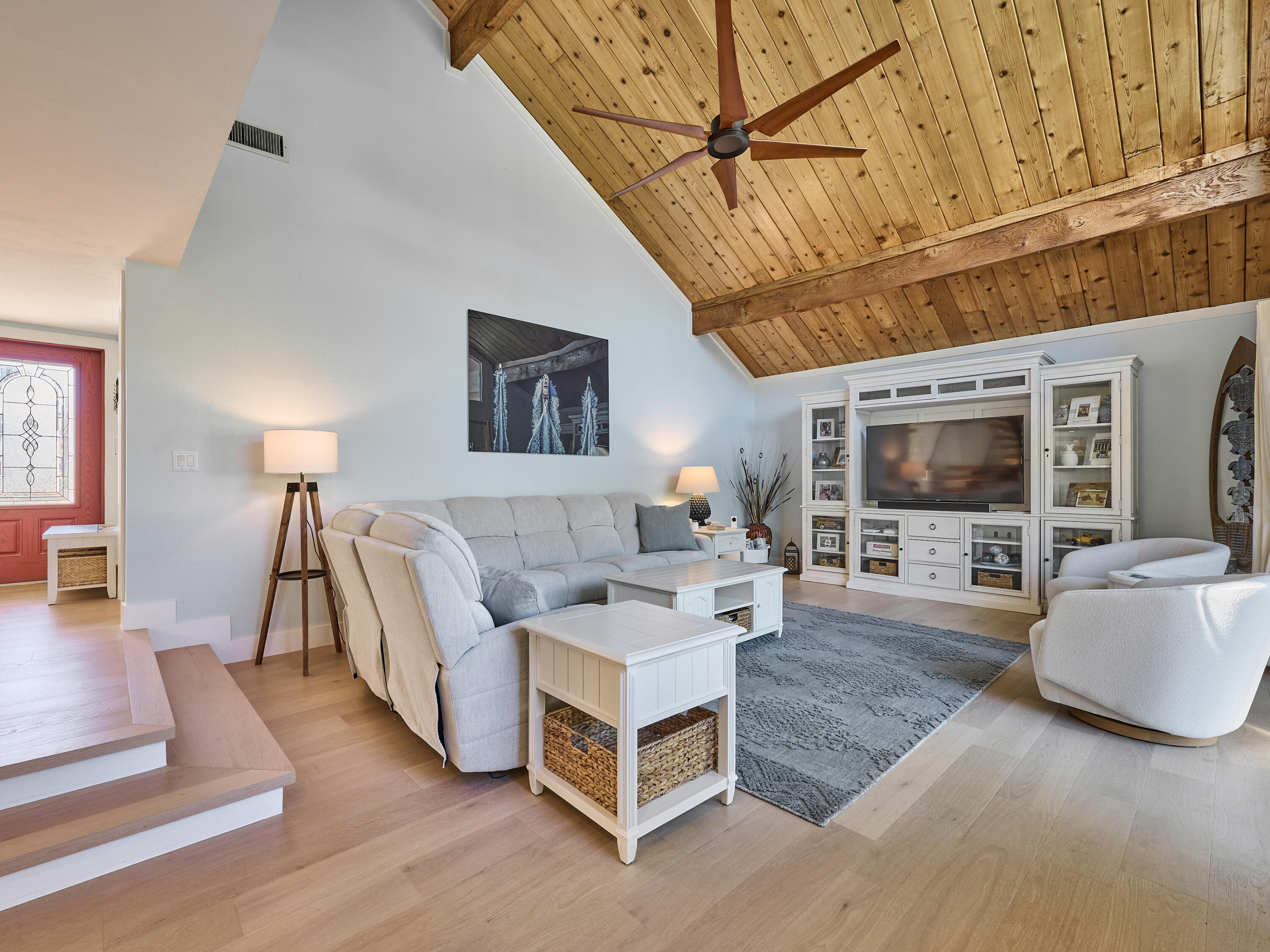 Undisclosed Address Jupiter, FL 33477 - Photo 5 of 20 a living room with furniture and a flat screen tv