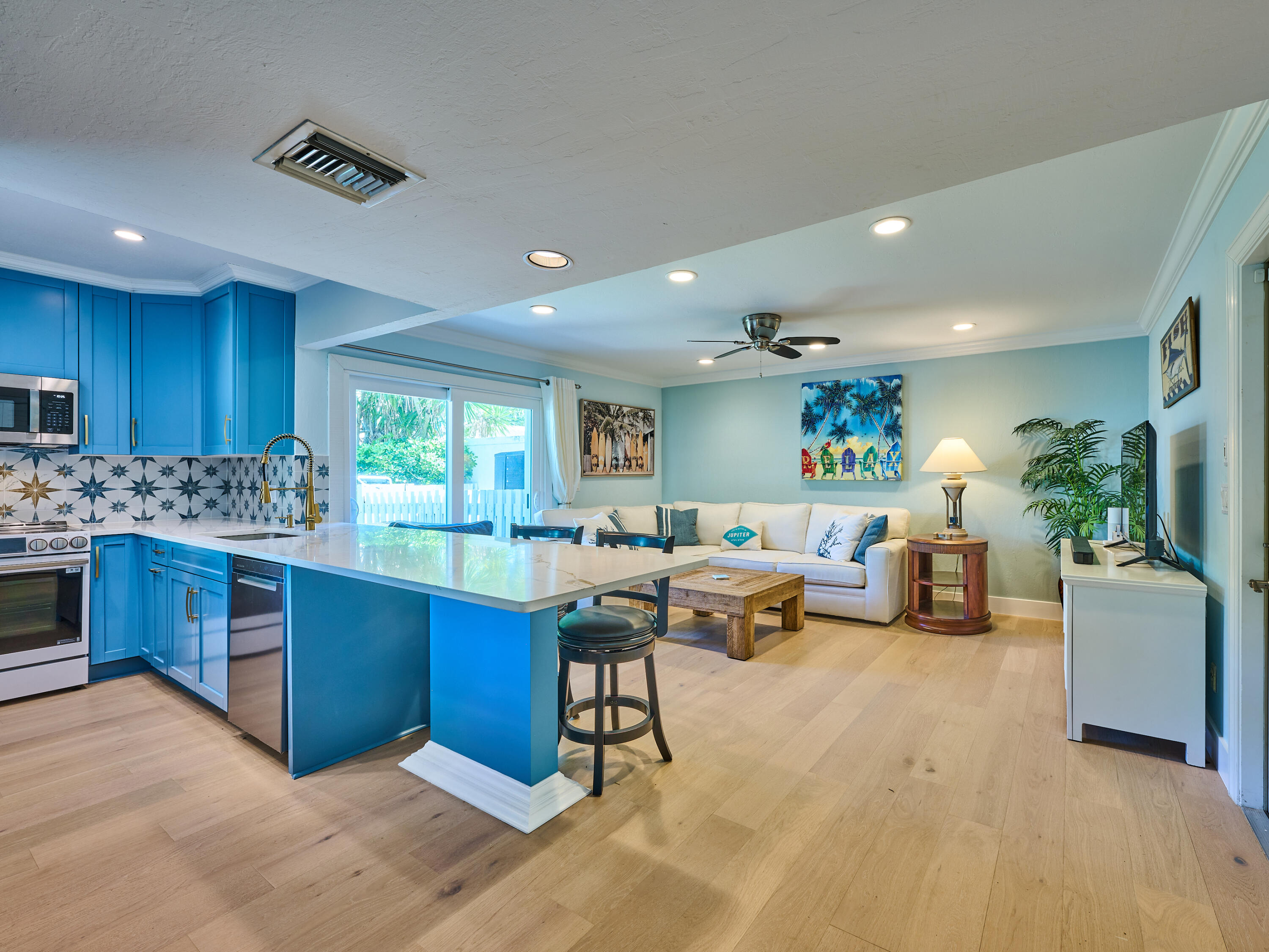 Undisclosed Address Jupiter, FL 33477 - Photo 6 of 20 a kitchen with stainless steel appliances granite countertop a stove and a refrigerator