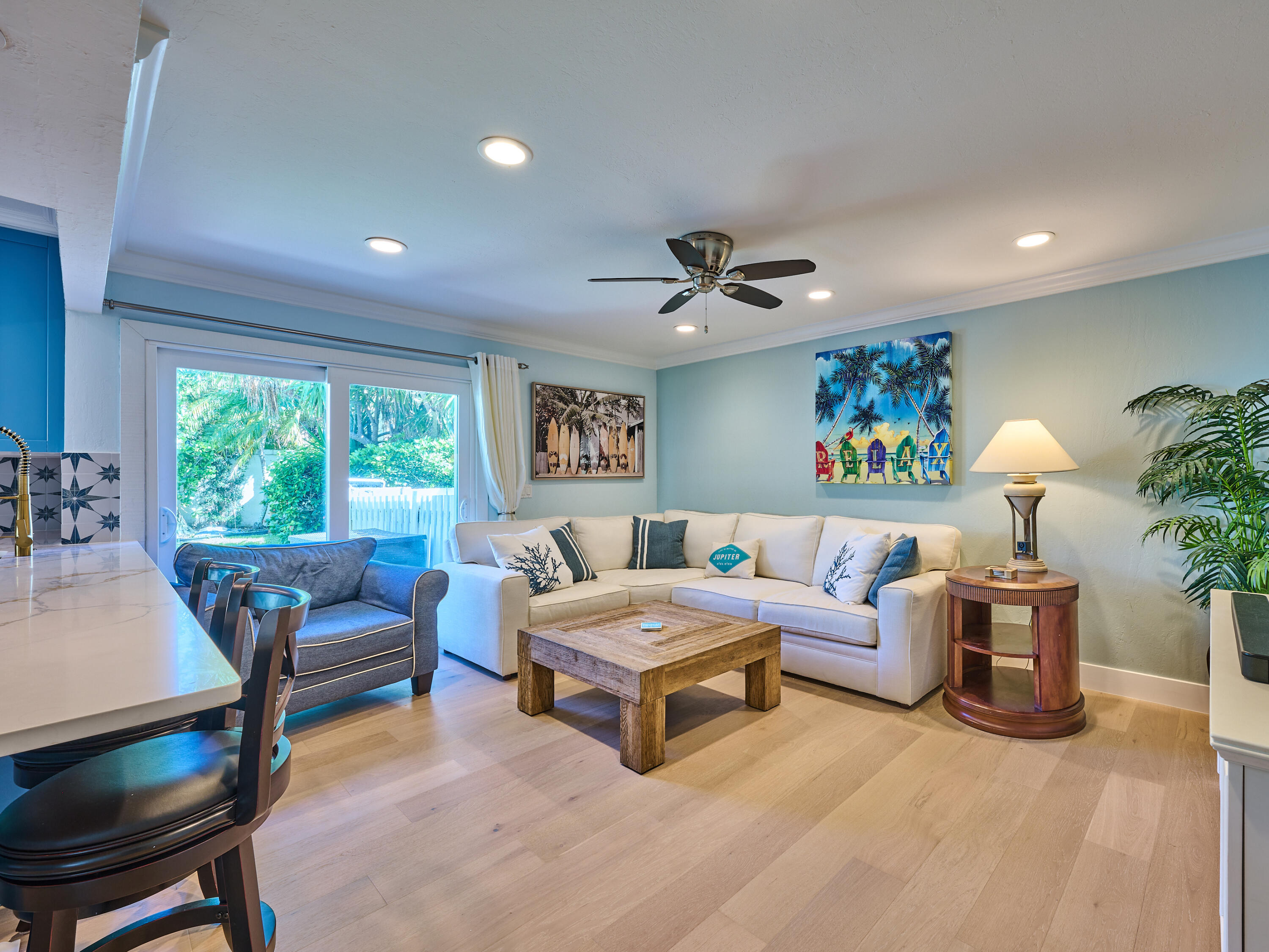 Undisclosed Address Jupiter, FL 33477 - Photo 9 of 20 a living room with furniture and a large window