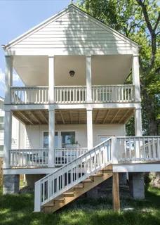 a view of a house with roof deck