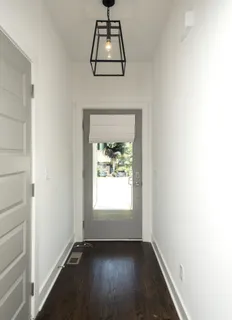 an empty room that has a window