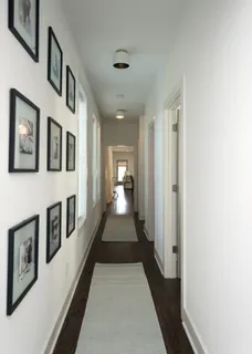 a view of a hallway with windows